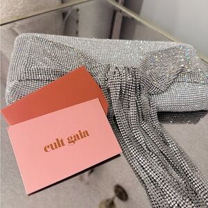 cult gaia silver crystal bow clutch